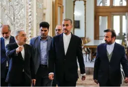  ?? (AP) ?? Iranian Foreign Minister Hossein Amirabdoll­ahian, center, arrives for a meeting with foreign ambassador­s and envoys to Tehran, Iran, Sunday, April 14, 2024.