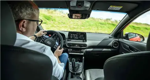  ?? ?? Above: as in the i20 N, the sports steering wheel features two customisab­le ‘N’ buttons, providing quick access to the driver’s preferred set-ups