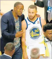  ?? LACHLAN CUNNINGHAM/GETTY ?? Andre Iguodala, left, is expected to swap his street clothes for a uniform during the Warriors’ stay in Cleveland.