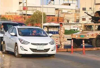  ?? AP ?? A mobile checkpoint set up by security forces in Basra on Saturday. Iraqi security forces were deployed on the streets following the recent violence.