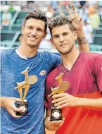  ?? BILD: SN/APA/GINDL ?? Thiem (r.) erreichte mit Novak das Doppel-Finale in Kitz.