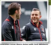  ?? GETTY IMAGES ?? Learning curve: Harry Arter with Jack Wilshere. Below: he celebrates after beating Everton