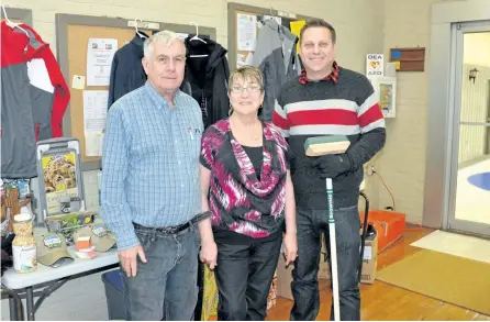  ?? SPECIAL TO THE EXAMINER ?? The annual Curl for Kids bonspiel was held Sunday at the Norwood Curling Club in support of Camp Oochigeas. The Wharram family have been organizing the Bonspiel in memory of their daughter and sister Tammy for many years. From left, Bruce and Marilyn...