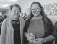  ??  ?? Jackie Wilson, left, and Chandra Wilson were among the family members there to salute Dr. Reginald Washington, his wife and children.