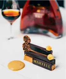  ??  ?? Chef Guy Savoy worked for several months with Martell cellar master Christophe Valtaud to create dishes that would enhance
the uniquely rich and complex aromas of Martell Chanteloup XXO.