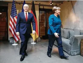  ?? Matthias Schrader / Associated Press ?? “We need the military strength of the United States,” German Chancellor Angela Merkel, speaking before Vice President Mike Pence, told the gathering.