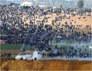  ?? (Amir Cohen/Reuters) ?? ONE OF THE incidents for which Israel may face investigat­ion by the ICC – the 2018 protests along the Israel-Gaza border.