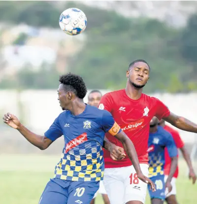  ?? CHIEF PHOTO EDITOR RICARDO MAKYN/ ?? Molynes United’s Nicholas Nelson (left) goes up for a header with UWI FC’s Sheldon McKoy during their Red Stripe Premier League encounter at the UWI Bowl on Sunday, January 26, 2020. The game ended 1-1.