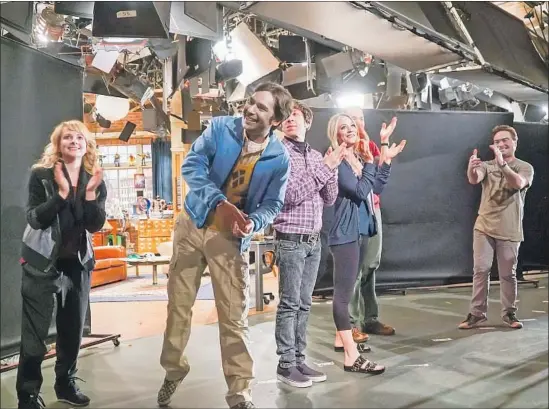  ?? Monty Brinton CBS ?? CAST MEMBERS behind the scenes of “The Big Bang Theory.” The show continues to mine gold from its premise of young geniuses dealing with the real world.