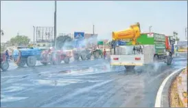  ?? DEEPAK GUPTA/HT PHOTO ?? The Lucknow Municipal Corporatio­n carried out a sanitisati­on drive in different parts of the city, to break the chain of Covid infection, on Sunday.