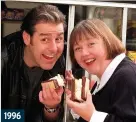  ??  ?? 1996 Just chill. Pauline Quirke and actor Andy Gray kept their cool during a BBC photocall with some delicious double nougat ice cream.