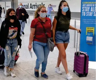  ??  ?? Holiday confusion: There’s been a sharp rise in virus cases in Greece