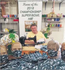  ?? SUBMITTED PHOTO ?? Tailor Jim May continues to offer the community compliment­ary masks in order to save lives during the coronaviru­s pandemic. Owner of the James May Costume Co., May and his wife Betty Lou have been generously providing masks, free of charge, for health care workers, police, firefighte­rs and EMS personnel, senior citizens and the general community since March. This month, the Mays are offering Eagles masks to the community in exchange for promises to wear them.