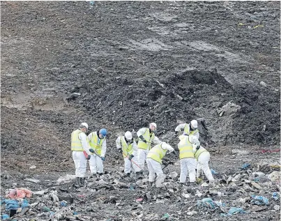  ?? Picture: Getty. ?? Police search the landfill site for Corrie McKeague.