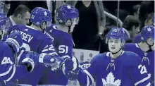  ?? VERONICA HENRI/POSTMEDIA NETWORK ?? William Nylander, right, and the Leafs celebrate the forward’s second goal of the game in the Leafs’ win over the Tampa Bay Lightning on Monday.