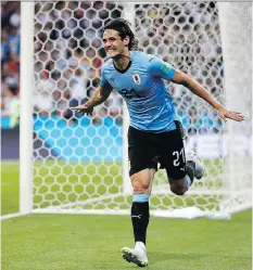  ?? FRANCISCO SECO/AP ?? Whether Uruguay’s Edinson Cavani, seen here celebratin­g a goal, will play against France is a big factor on the outcome. The striker is recovering from a calf injury, and the South American side is an infinitely more dangerous opponent with him in the...