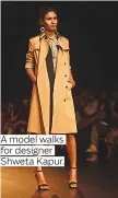  ??  ?? A model walks for designer Shweta Kapur.