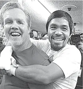  ?? / FIGHTSPORT­S.COM ?? ■ BUWAG?: Usa lang kini sa mga hulagway nga malipayong nag-uban sila si Freddie Roach (tuo) ug boxing icon Manny Pacquiao (wa) apan ning bag-uhay lang, gikataho nga nagbuwag na ang ilang mga dalan. Giklaro ni Pacquiao nga wala siya personal nga miasoy...