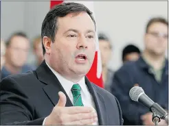  ?? — CP FILES ?? Jason Kenney will impose a moratorium on the Temporary Foreign Workers Program in food services.