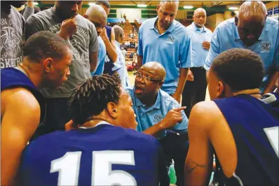 ?? CHRISTOPHE­R DEVARGAS (2013) ?? Coach Freddie Banks of Canyon Springs High School is giving credit to “his kids” as they battle for a basketball state championsh­ip beginning today in Reno.