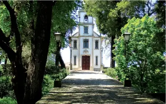  ??  ?? Above: Some sections of trail from Porto to Santiago run parallel to busy roads, but never for long stretches. Right: One of many Baroque churches along the way.