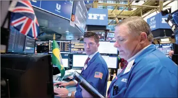  ?? | MICHAEL NAGLE / Bloomberg ?? Traders work on the floor of the New York Stock Exchange. The writer says turning points in the markets are mostly event-driven such as US President Donald Trump’s trade policies and sanctions.