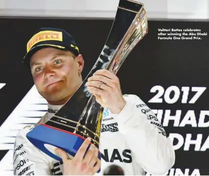  ??  ?? Valtteri Bottas celebrates after winning the Abu Dhabi Formula One Grand Prix.