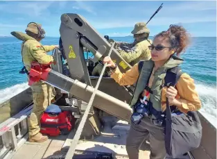  ??  ?? Fiji Sun Digital journalist Jennis Naidu onboard the landing craft heading to Galoa Island.