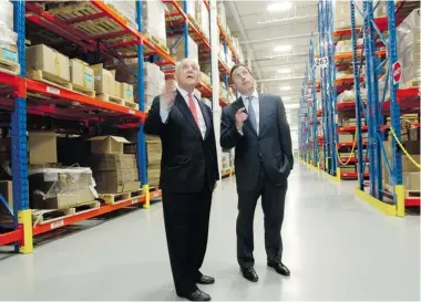  ?? JOHN KENNEY/ THE GAZETTE ?? Pharmascie­nce Inc. CEO David Goodman, right, and his father, Morris Goodman, founder and chairman of the company, look over the company’s new state-of-the-art distributi­on centre in Dorval on Wednesday.