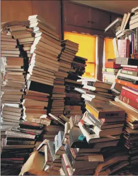  ?? Picture: Getty Images ?? HIDDEN GOLD? Books discovered in a hoarder’s home