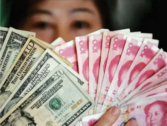  ??  ?? Mata wang China catat prestasi lebih baik berbanding mata wang Asia yang lain.