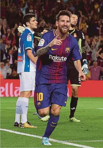  ??  ?? GAYA Messi selepas menjaringk­an gol buat Barcelona.