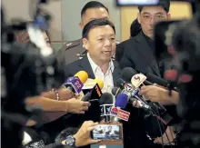  ?? SAKCHAI LALIT/THE ASSOCIATED PRESS ?? Thailand’s National Broadcasti­ng and Telecommun­ication Commission Secretary-General Takorn Tantasith talks to reporters in Bangkok, Thailand, on Tuesday. Thailand has backed off a threat to block Facebook in the country.