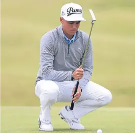  ?? Picture: PA. ?? Rickie Fowler takes a moment over a putt.