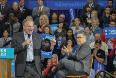  ?? ERIC BONZAR — THE MORNING JOURNAL ?? Virginia Sen. and vice presidenti­al hopeful Tim Kaine and U.S. Sen. Al Franken, D-Minn., promoted early voting and stumped for Democratic presidenti­al nominee Hillary Clinton during a rally at Lorain High School, Oct. 27.