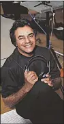  ?? Rojon Production­s/Columbia Archives ?? Still making music: Johnny Mathis, pictured here at an undated recording session, released an album of cover songs, Johnny Mathis Sings the Great New American Songbook, in 2017