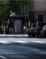  ??  ?? A bicycle rider crosses an empty street in Washington, D.C., the U.S., on April 11