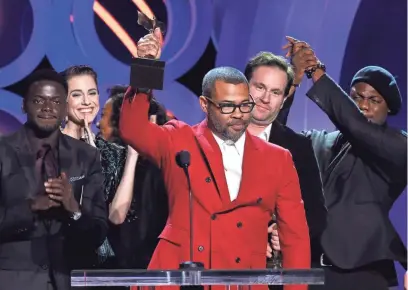  ?? CHRIS PIZZELLO/INVISION/AP ?? Jordan Peele took home two awards, for best feature and best director, at Saturday’s Film Independen­t Spirit Awards. The audience loved the results, giving the writer/director a pair of standing Os.