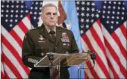  ?? OLIVIER MATTHYS — THE ASSOCIATED PRESS ?? U.S. Joint Chiefs Chairman Gen. Mark Milley acknowledg­ed Tuesday that one of the U.S. missiles fired at an unidentifi­ed aerial object over Lake Huron missed the target.