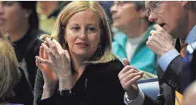  ??  ?? Mayor Megan Barry talks to Sgt. Robert Forrest of her security staff during a basketball game last March. GEORGE WALKER IV/USA TODAY NETWORK