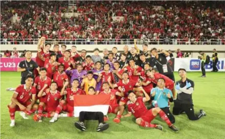  ?? ?? Indonesia players celebrate after beating South Korea in the Under-23 Asian Cup quarter-finals in a dramatic penalty shootout in Doha on Thursday.