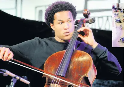  ??  ?? » CELLIST Sheku Kanneh-mason MBE, playing with the Kanneh-mason family at the live ‘House of Music : Raising the Kanneh-masons’ event held at the Cheltenham Literature Festival in the Cheltenham Town Hall on Monday. Sheku won the 2016 BBC Young Musician award and famously played at the wedding of Prince Harry to Meghan Markle on 19 May 2018.
Pictures: Paul Nicholls