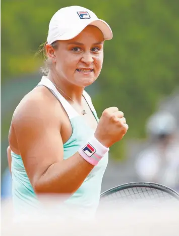  ?? Picture: CAMERON SPENCER/GETTY ?? SWEET VICTORY: Ash Barty celebrates her win over Natalia Vikhlyants­eva in the first round of the French Open at Roland Garros.