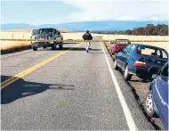  ?? AP ?? Crime tape blocks off Rancho Tehama Road leading into the Rancho Tehama subdivisio­n south of Red Bluff, California following a fatal shooting yesterday