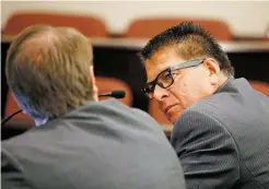  ?? LUIS SÁNCHEZ SATURNO/THE NEW MEXICAN ?? Elias Coriz, who lost a primary race for Rio Arriba County commission­er, listens Thursday as Judge Jason Lidyard questions Rio Arriba County Bureau of Elections Chief Michele Jordan.