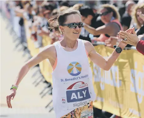  ??  ?? Olympian Alyson Dixon finishes second in the Sunderland City Runs half marathon a couple of years ago.