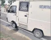  ?? HT PHOTO ?? The van from which cash was looted in Sangrur on Friday.