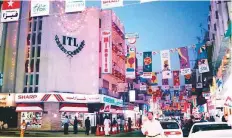  ??  ?? The ITL Cosmos building was the first building to come up in Meena Bazaar when it moved from the abra area (left) in 1973. The shop Meena Bazaar, from which the market got its name, was located down the road, at the very entrance.