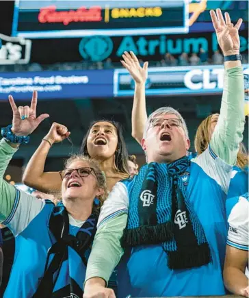  ?? AP FILE ?? Fans cheer before an MLS match last season between Charlotte FC and the LA Galaxy. The 2023 season opens Saturday.