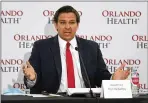  ?? JOHN RAOUX / AP ?? Florida Gov. Ron DeSantis speaks at Orlando Regional Medical Center this past Tuesday. DeSantis spoke about Florida’s caseload of coronaviru­s topping 100,000.